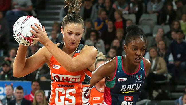 Susan Pettitt battles with Vixens defender Kadie-Ann Dehaney.