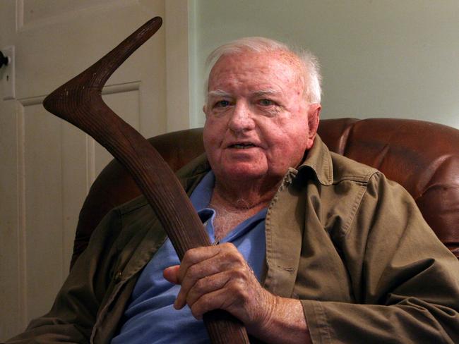 Jim Ferguson in 2008 with the “number seven” boomerang he acquired in the Tanami Desert. Picture: David Crosling.