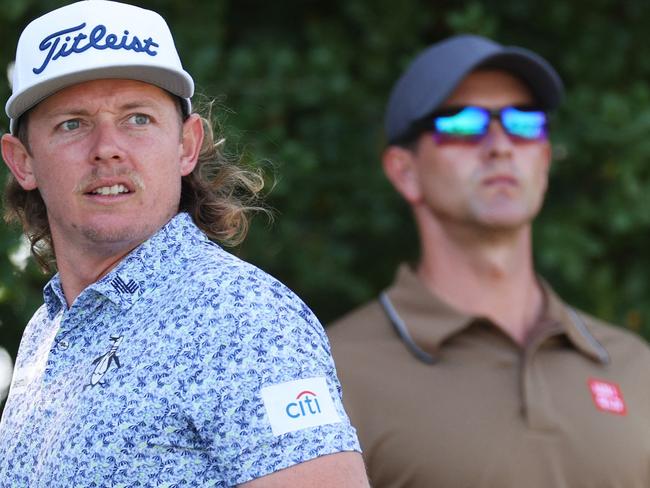 LOS ANGELES, CALIFORNIA - JUNE 13: Cameron Smith of Australia and Adam Scott of Australia look on during a practice round prior to the 123rd U.S. Open Championship at The Los Angeles Country Club on June 13, 2023 in Los Angeles, California.   Andrew Redington/Getty Images/AFP (Photo by Andrew Redington / GETTY IMAGES NORTH AMERICA / Getty Images via AFP)