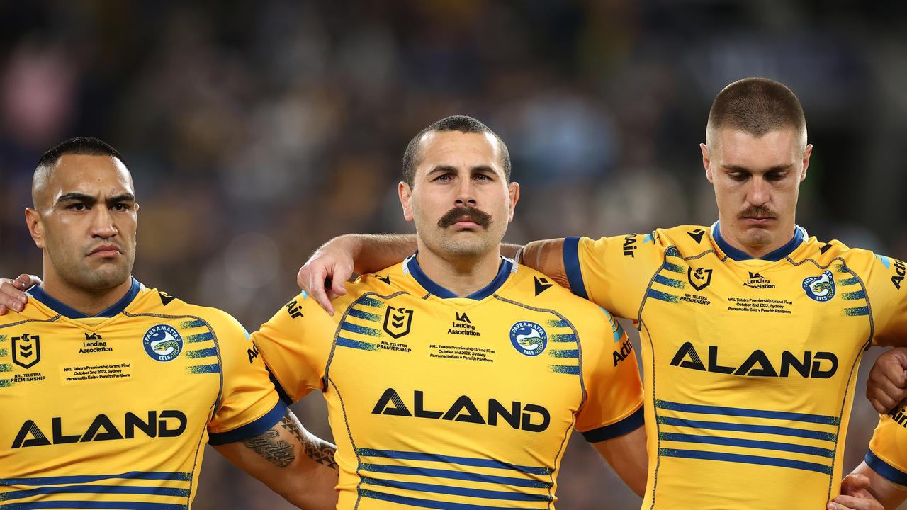 SYDNEY, AUSTRALIA - OCTOBER 02: Marata Niukore, Reagan Campbell-Gillard and Shaun Lane of the Eels line up for the national anthem during the 2022 NRL Grand Final match between the Penrith Panthers and the Parramatta Eels at Accor Stadium on October 02, 2022, in Sydney, Australia. (Photo by Mark Kolbe/Getty Images)