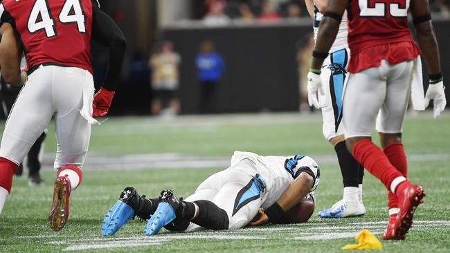 Damontae Kazeee ejected for illegal hit on Cam Newton.