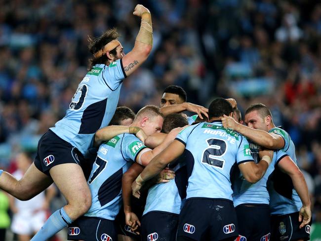 Blew previous audience figures ... NSW's Trent Hodkinson celebrates scoring the vital try with team mates during Game 2 of the 2014 State of Origin series at ANZ Stadium. Picture: Gregg Porteous