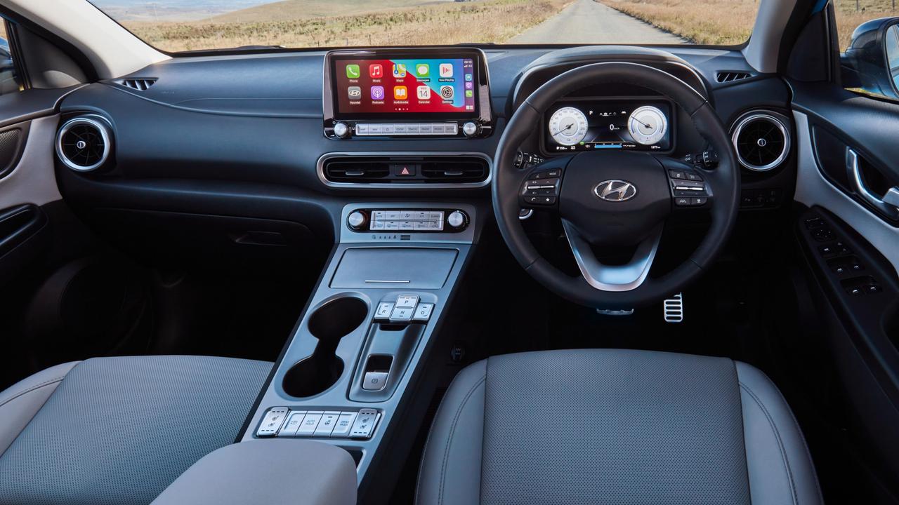 Interior features of the Hyundai Kona Electric Highlander include dual 10.25 screens, leather trim, heated and ventilated front seats and an eight-speaker Harman Kardon sound system.