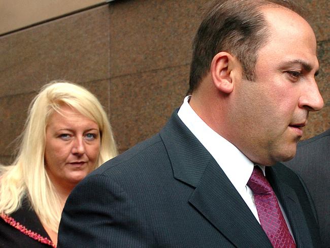 15 Nov 2004 : Gangland boss, Tony Mokbel with his legal team Nicola Gobbo (left) and Con Heliotis QC (right) outside the Magistrates Court - crime Vic drugs headshot mobile phone profile