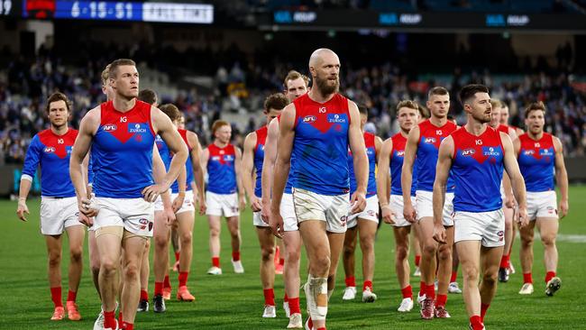 The Demons look dejected. Photo by Michael Willson/AFL Photos.