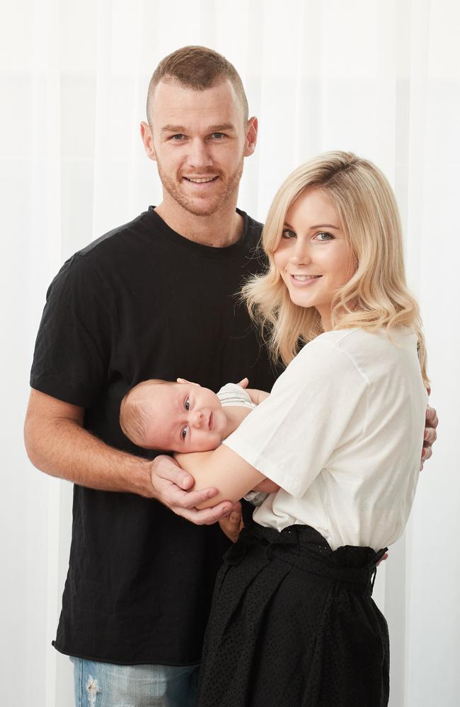 Robbie and Annabel Gray with their newly born son Aston at their Henley Beach home. Picture: AAP Image/MATT LOXTON