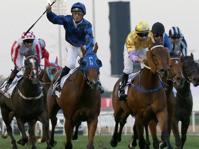 Buffering and Damian Browne after winning in the Al-Quoz Sprint in Dubai. Picture: AFP