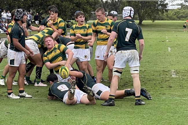 Manaaki Bateman scoring his third try in an AIC First XV rugby match last year for St Patrick’s College.