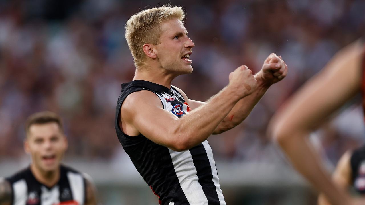 MELBOURNE, AUSTRALIA - APRIL 25: Billy Frampton of the Magpies celebrates a goal during the 2023 AFL Round 06 match between the Collingwood Magpies and the Essendon Bombers at the Melbourne Cricket Ground on April 25, 2023 in Melbourne, Australia. (Photo by Michael Willson/AFL Photos via Getty Images)