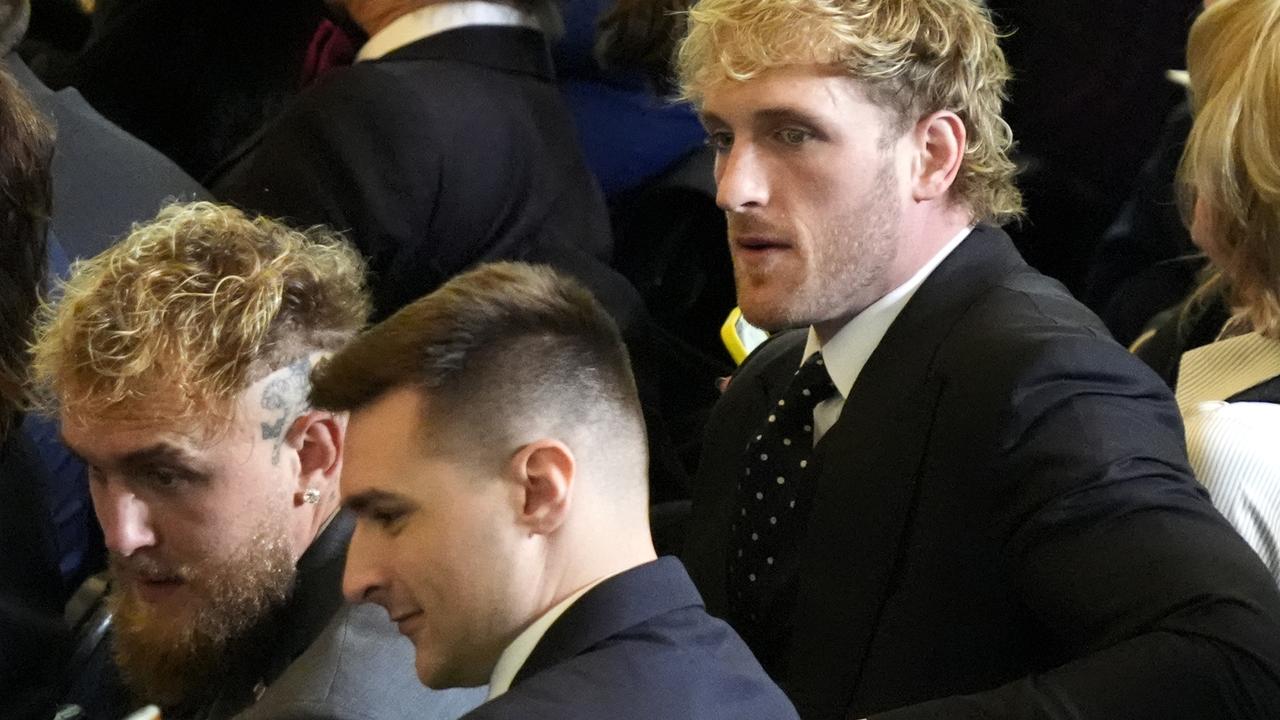 Jake Paul (L) and Logan Paul (R) sit the VIP viewing area in Emancipation Hall for the Inauguration of Donald Trump. Picture: Jasper Colt - Pool/Getty Images