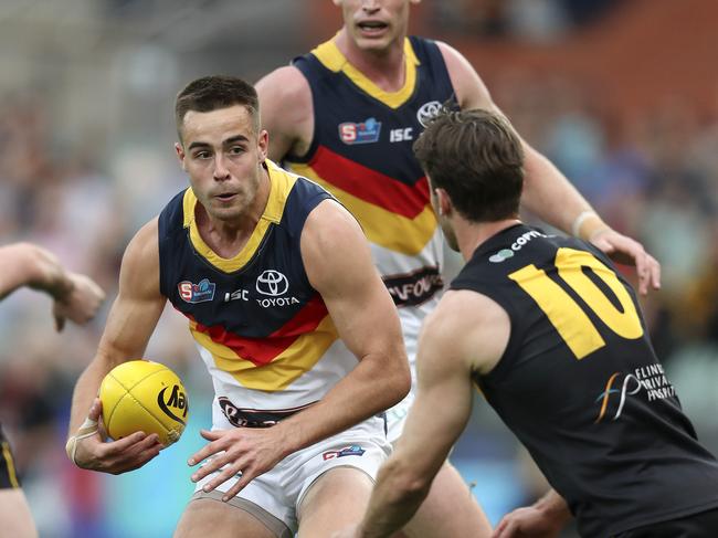 Myles Poholke playing for Adelaide.