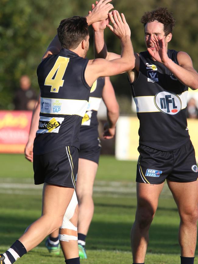 Hamish Paynter celebrates a goal with Josh Grabowski during an NFL representative fixture. Picture: Mark Wilson