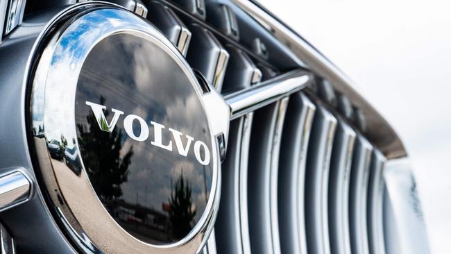 The Volvo emblem is seen on the front bumper of a vehicl in Austin, Texas. Volvo has cancelled plans to sell fully electric vehicles exclusively, stating that the company may need to hold onto its hybrid models as the transition to electric vehicles continues to develop.