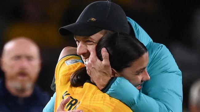 Tony Gustavsson embraces Sam Kerr after the 2-0 win. Picture: AFP