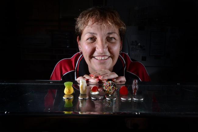 SWEET BARGAIN: Valerie McWhirter from North Lismore News with lollies you can buy for five cents. Picture: Cathy Adams