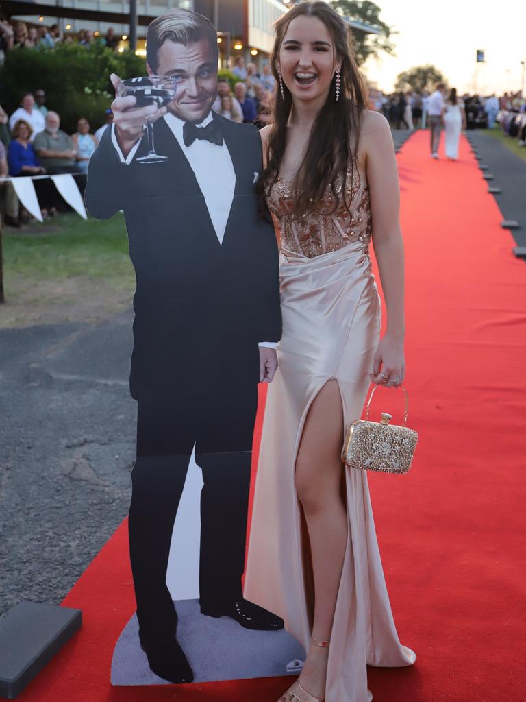 Mackenzie Knickel (and Leonardo DiCaprio cutout) at the James Nash State High School formal 2022.