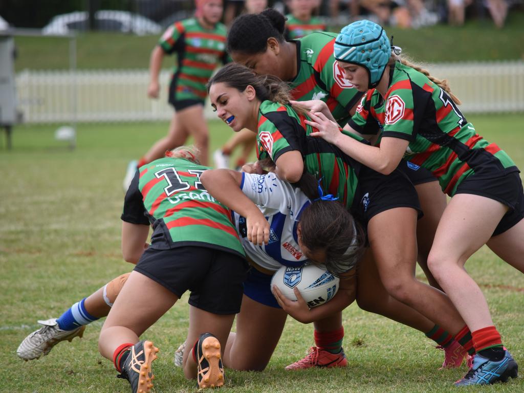 Tajahla-Jane Daniels-Maifea is brought to ground in a tackle. Picture: Sean Teuma. Lisa Fiaola Cup