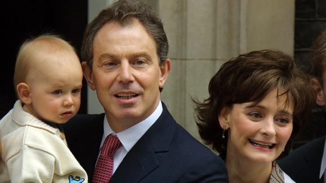 With youngest son Leo on the doorstep to No 10 Downing Street in London in 2002.