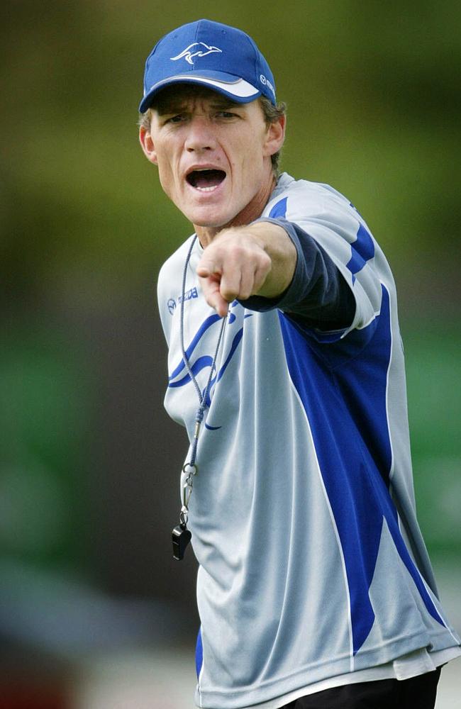 On top of the game ... belting out instructions while coaching North Melbourne Kangaroos. At that time Danielle was privately grappling with her gender dysphoria and had yet to try drugs.