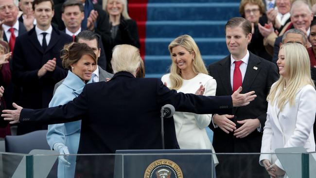 Donald Trump embraces Melania, left, and Ivanka at his inauguration.