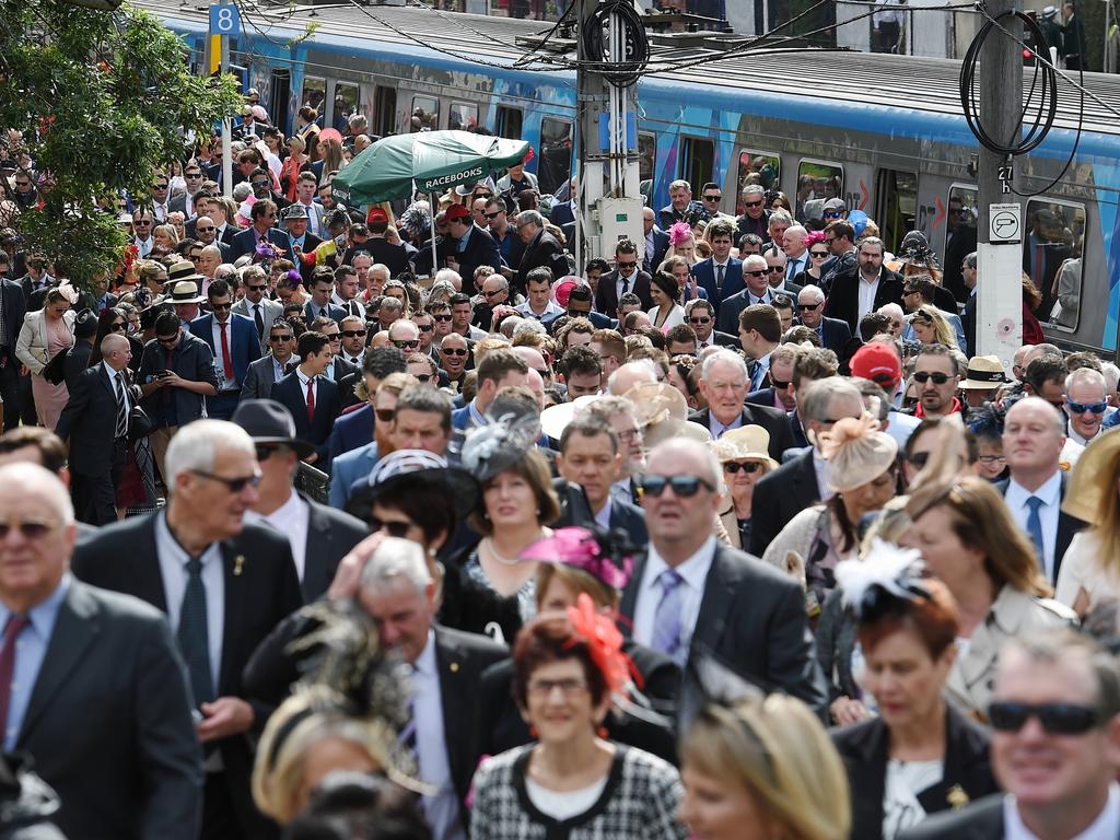 The rush is on ... Punters arrived early for the Melbourne Cup, with the train a wise way to go. Picture: Jake Nowakowski