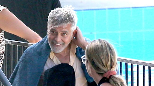 George Clooney leaves the film set at Centenary pool in Brisbane’s Spring Hill. Picture: Steve Pohlner