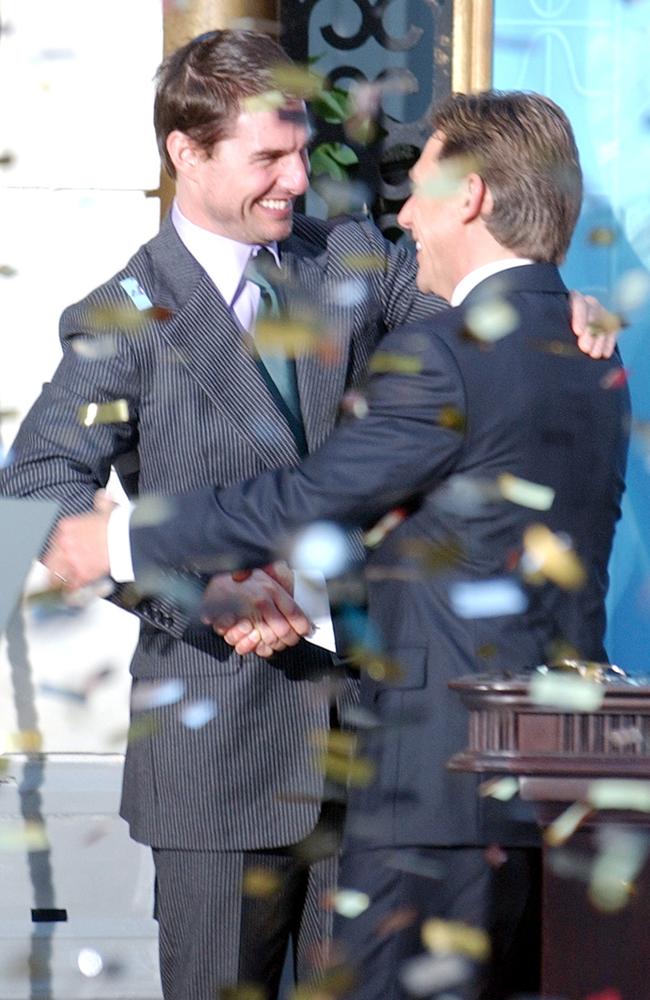 Tom Cruise embraces Scientology leader David Miscavige at the official opening of a new church in Madrid in 2004. Picture: Supplied