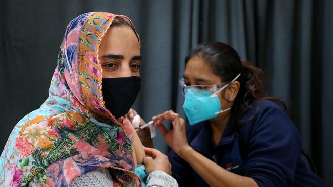 A nurse administers a Covid vaccine at an Australian Sikh Association pop-up clinic in Glenwood, Sydney, on Thursday. Picture: Getty Images