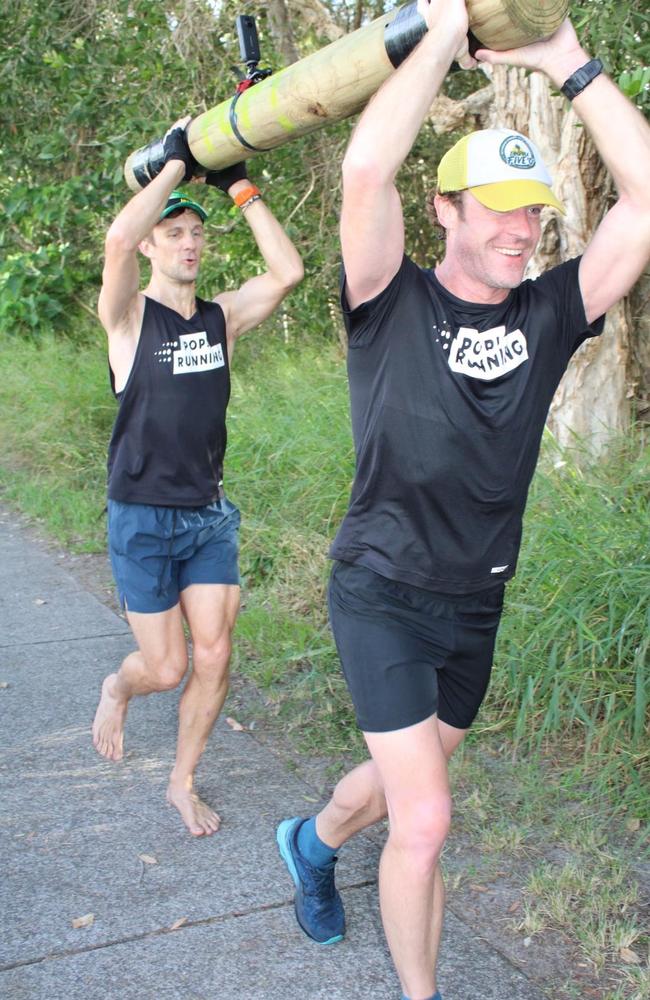 Sam Stow (back) and Rob Ormsby completing the David Goggins' 4x4x48 challenge. Picture: Mudjimba Park Run.