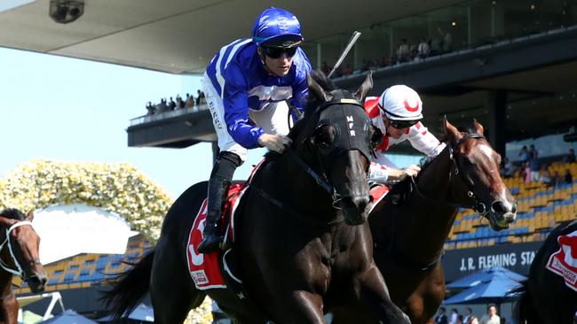 SYDNEY, AUSTRALIA - MARCH 30: Tommy Berry riding Wymark wins Race 4 The Toyota Forklifts Tulloch Stakes during Sydney Racing at Rosehill Gardens on March 30, 2024 in Sydney, Australia. (Photo by Jason McCawley/Getty Images)