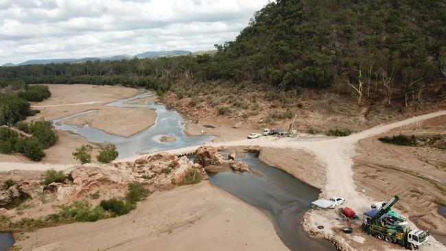 Geotechnical drilling under way on the Burdekin River north of Charters Towers as part of the Hells Gate Dam.