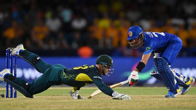 Matthew Wade misses a chance to stump Rahmanullah Gurbaz. Picture: Gareth Copley/Getty Images