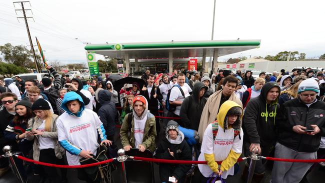 A large crowd gathers at the new Krispy Kreme store for the official opening in 2014. Picture: Tricia Watkinson.