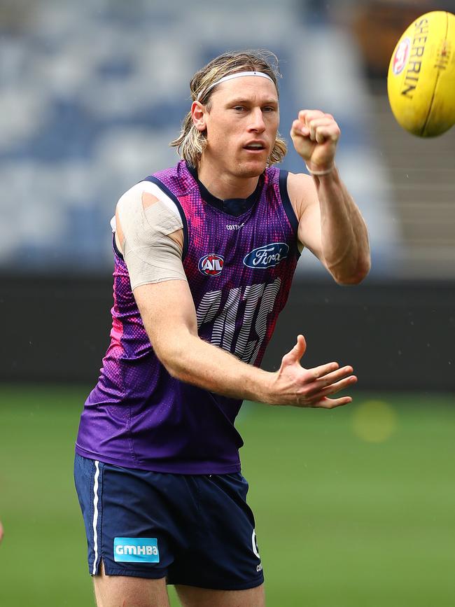 Mark Blicavs tested out his leg at training. Picture: Alison Wynd