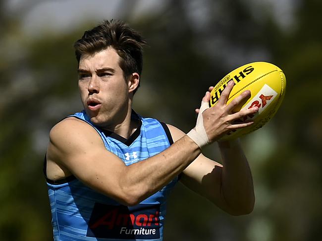 GOLD COAST, AUSTRALIA - AUGUST 20: Zach Merrett in action during an Essendon Bombers AFL training session at Metricon Stadium on August 20, 2020 in Gold Coast, Australia. (Photo by Albert Perez/Getty Images)