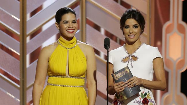 America Ferrera, left, and Eva Longoria present an award at the 73rd Annual Golden Globe Award. Picture: Paul Drinkwater