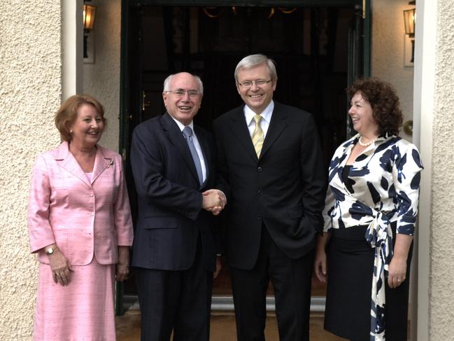 Outgoing Prime Minister John Howard with wife Janette (L) officially hands over The Lodge to incoming PM Kevin Rudd and wife Therese Rein in Canberra. Pic. Ray Strange