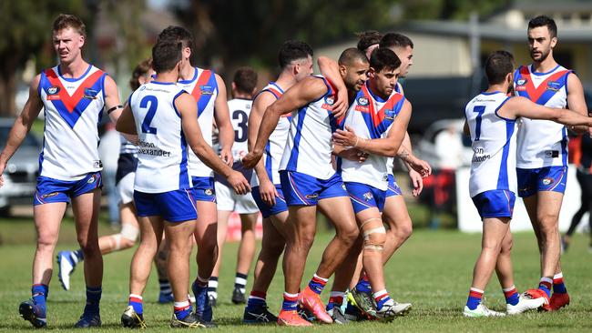 West Preston-Lakeside teammates congratulate Ahmed Saad after a goal. Picture: Steve Tanner