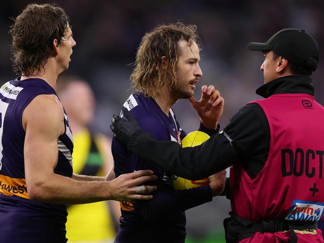 Aish had to be helped from the field following the clash. Picture: Paul Kane/Getty Images