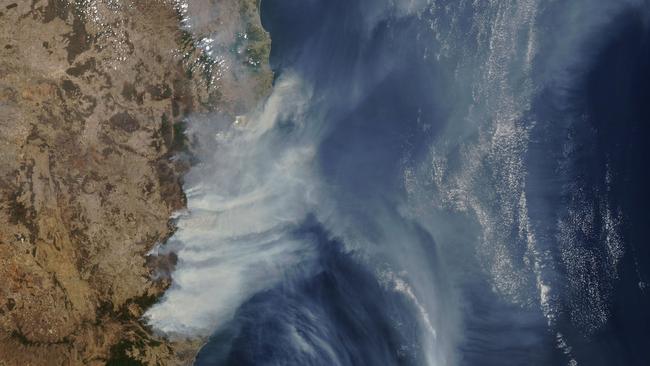 Bushfire smoke rising high and far across the atmosphere. Picture: NASA