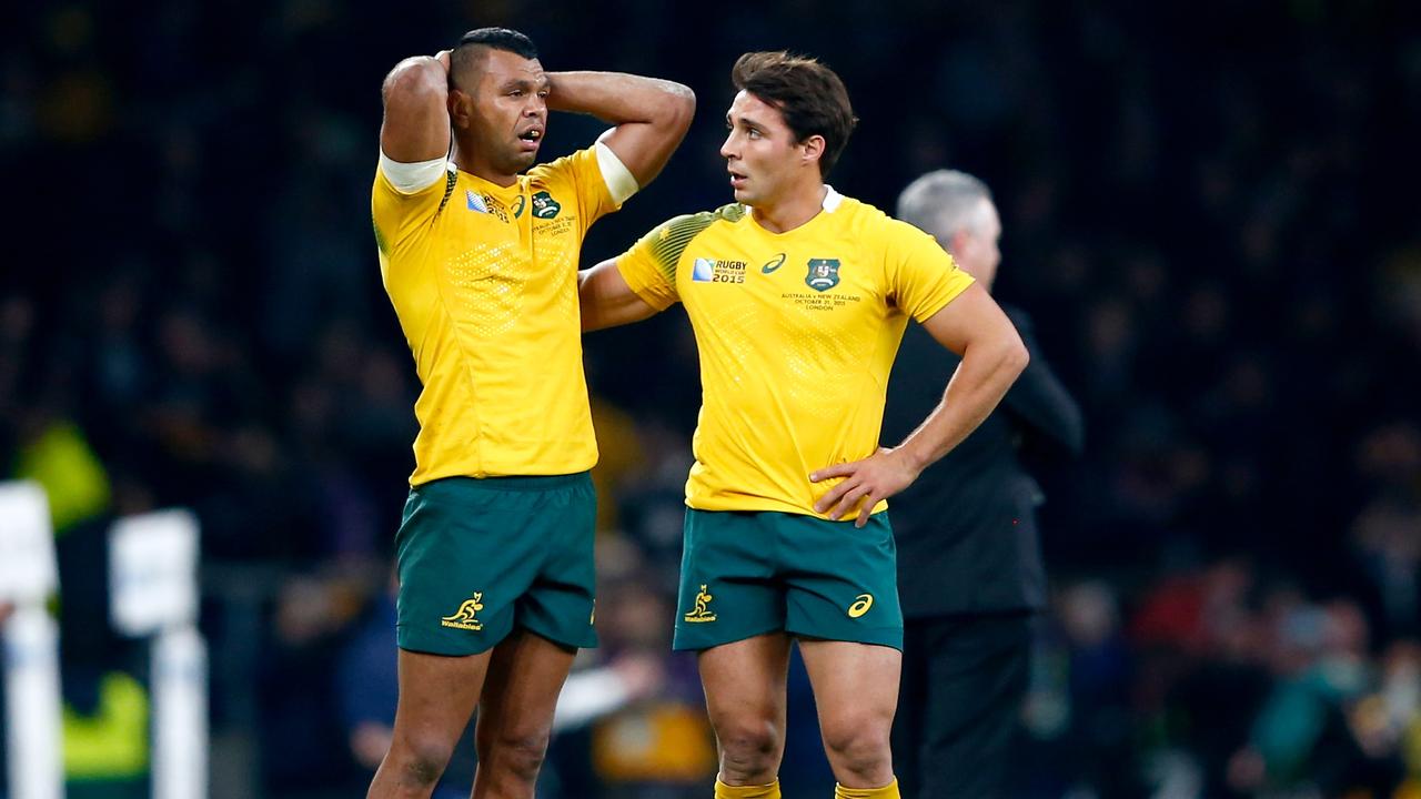 Kurtley Beale and Nick Phipps are dejected following defeat in the 2015 RWC final.