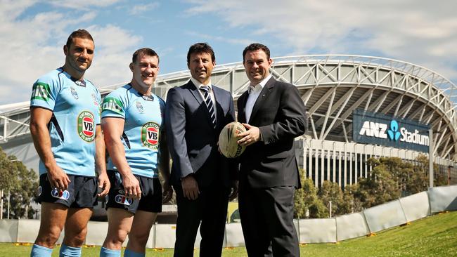 Blues players Robbie Farrah, Paul Gallen, Laurie Daley and minister Stuart Ayres outside ANZ Stadium.