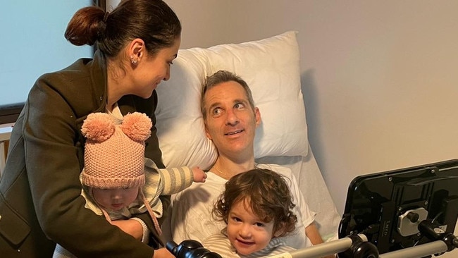 Johnny with his wife and daughters having treatment.