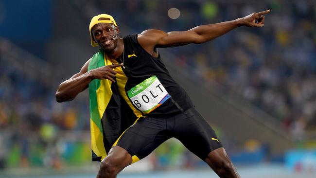 Usain Bolt of Jamaica celebrates winning the Men's 100m Final at the Rio Olympics.
