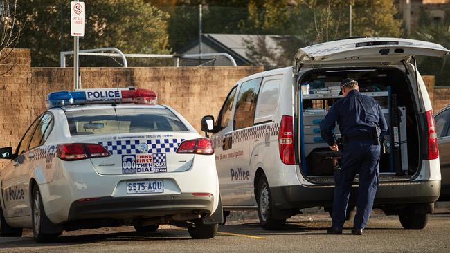 Police at the scene, where a female student was stabbed at an Adelaide private school. Picture: Matt Loxton