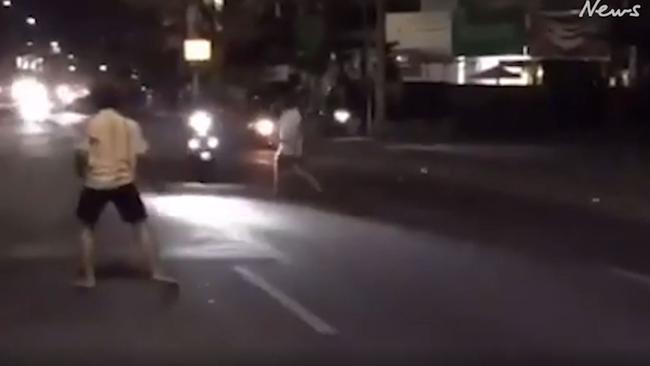 Carr was caught on video kicking a passing motorbike and throwing himself into moving cars.