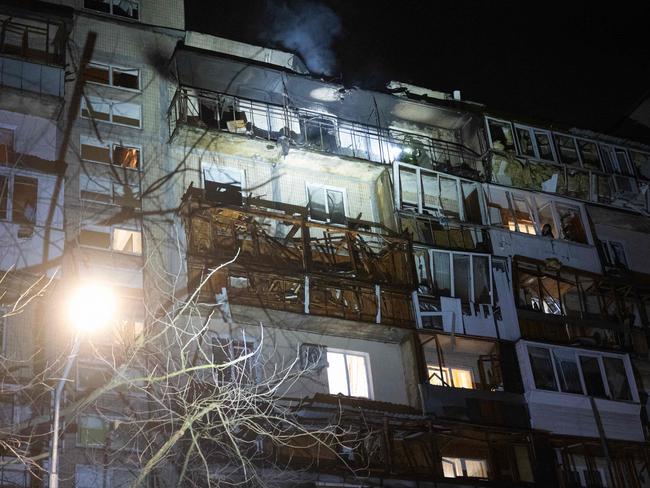 A damaged residential building is seen following a drone attack in Kyiv on March 23. Picture: Genya Savilov/AFP