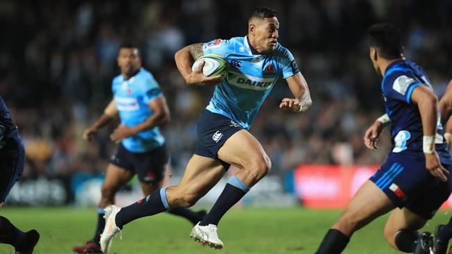 The Waratahs’ Israel Folau on the charge.