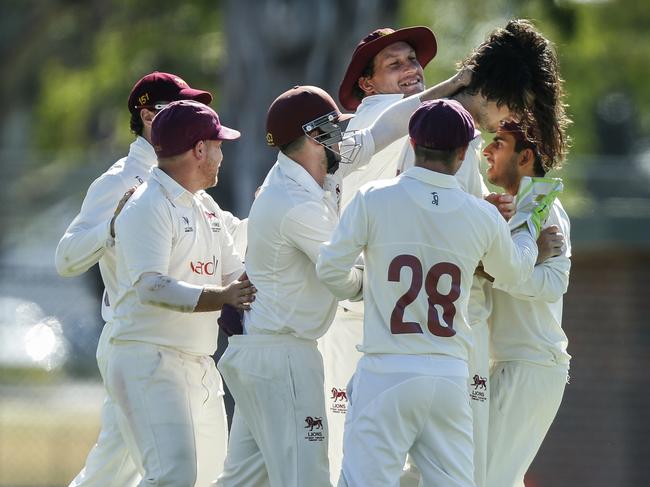 Fitzroy Doncaster celebrate a wicket. Picture: Valeriu Campan