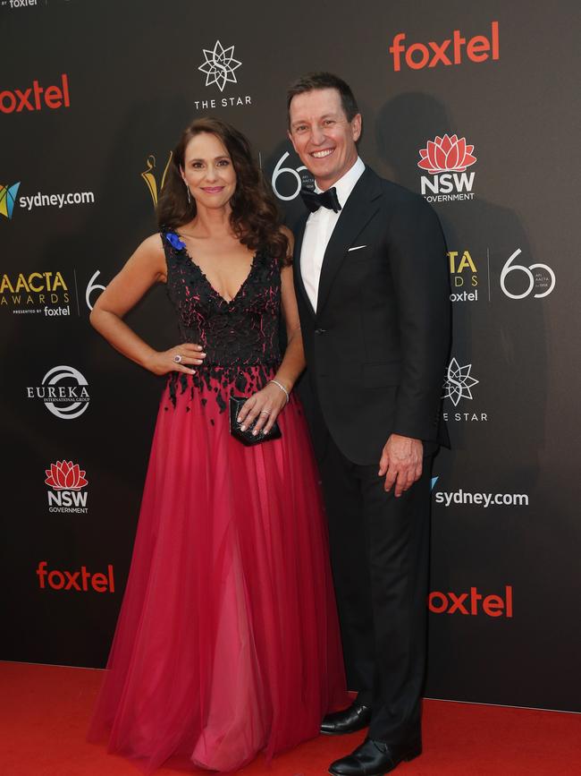 Rove McManus and wife Tasma Walton arrive at the 2018 AACTAs. Picture: Richard Dobson